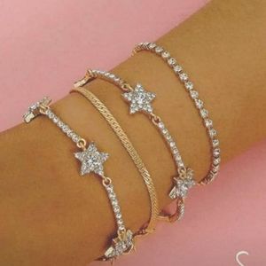 STAR AND SNAKE CHAIN BRACELET SET.